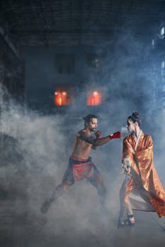 Intense cosplay martial arts duel with traditional Japanese attire in misty atmosphere.